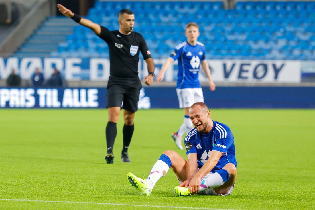 Veton Berisha fikk seg en smell da Molde fikk frispark like før slutt. Foto: Svein Ove Ekornesvåg / NTB
